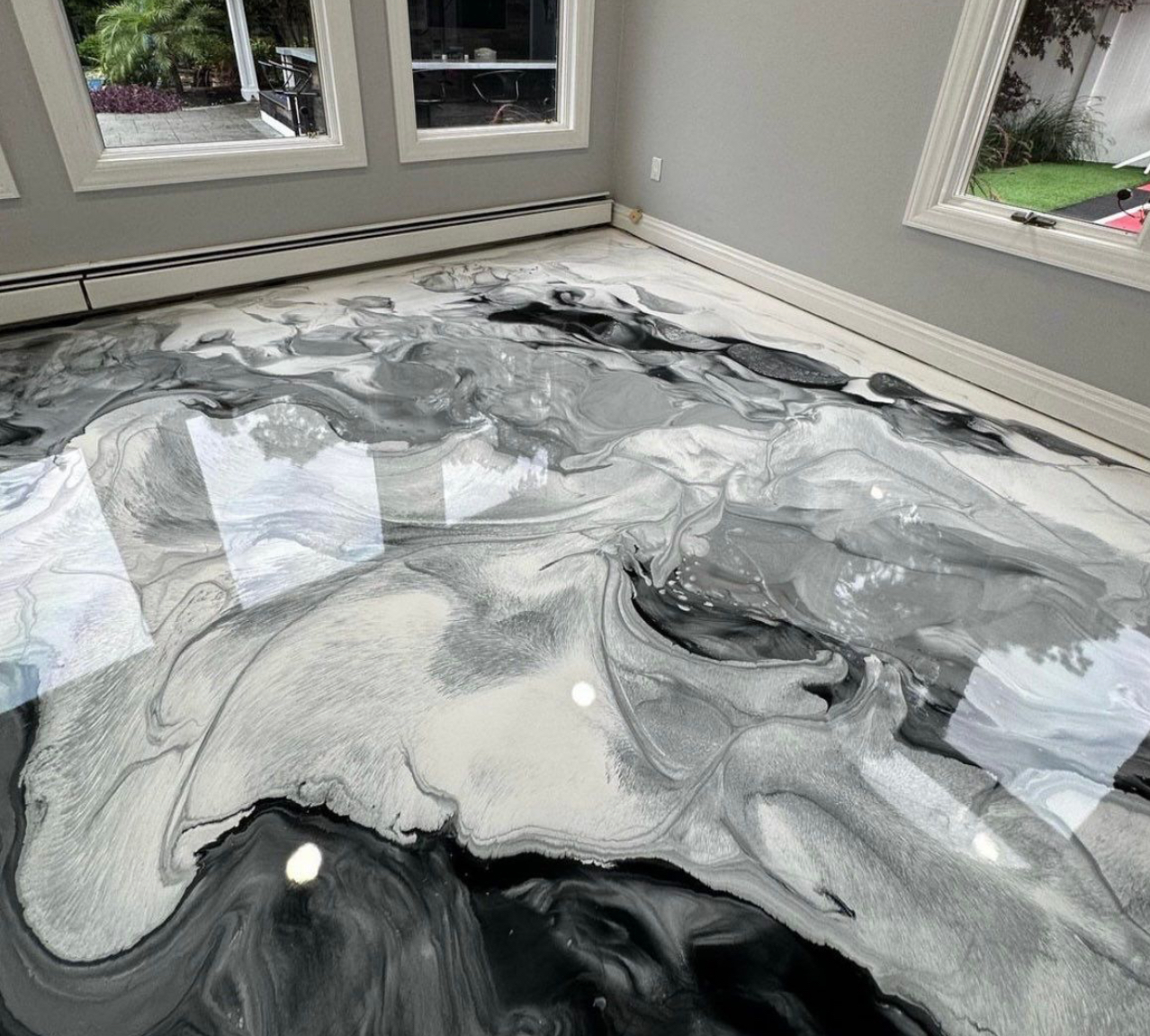 Metallic epoxy garage floor installation in Austin TX with glossy decorative finish by ABC Austin Home Renovations