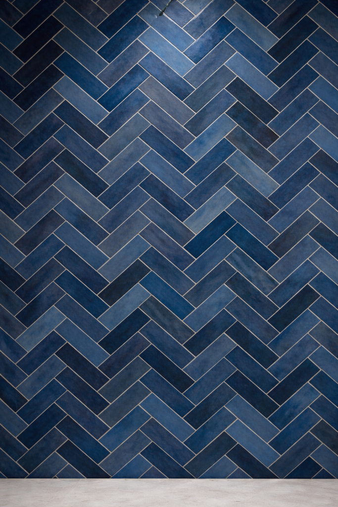 Herringbone tile installation and custom bathroom tile design in Austin, TX