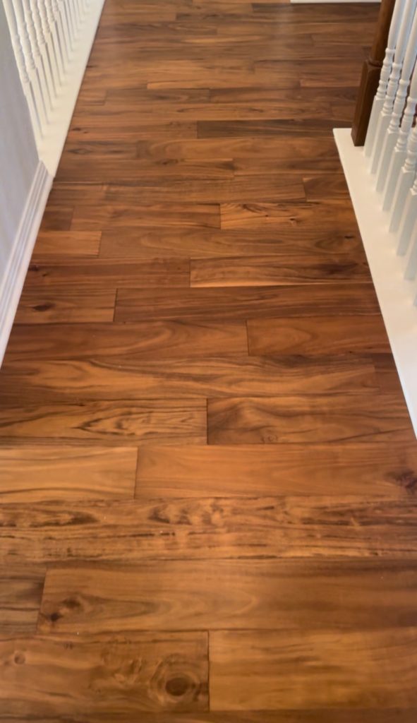 Finished hardwood floor installation in hallway in Austin, TX by ABC Austin Home Renovations