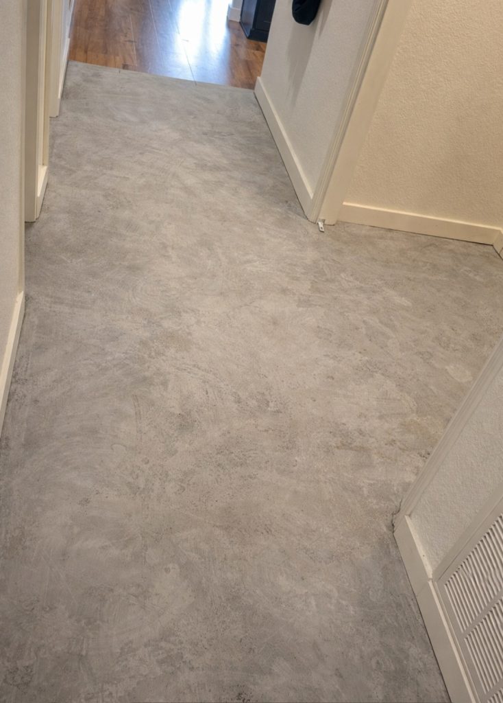 Tile floor preparation and leveling before installation in residential home in Austin Texas 