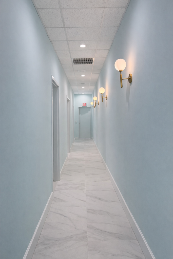 Professional interior wall painting contractor Austin Texas hallway painting