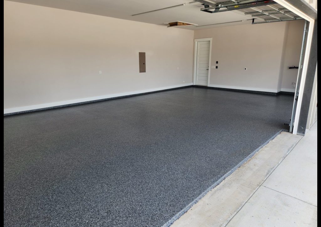 Garage floor epoxy flake coating with protective clear topcoat in Austin TX